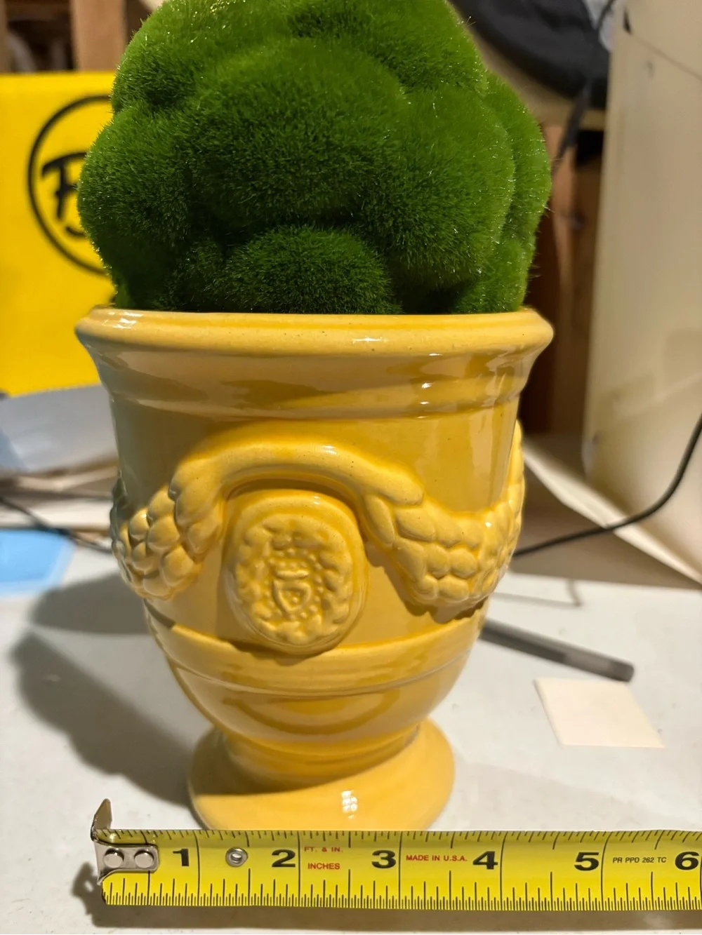 Yellow Ceramic Urn Planter with Decorative Emblem